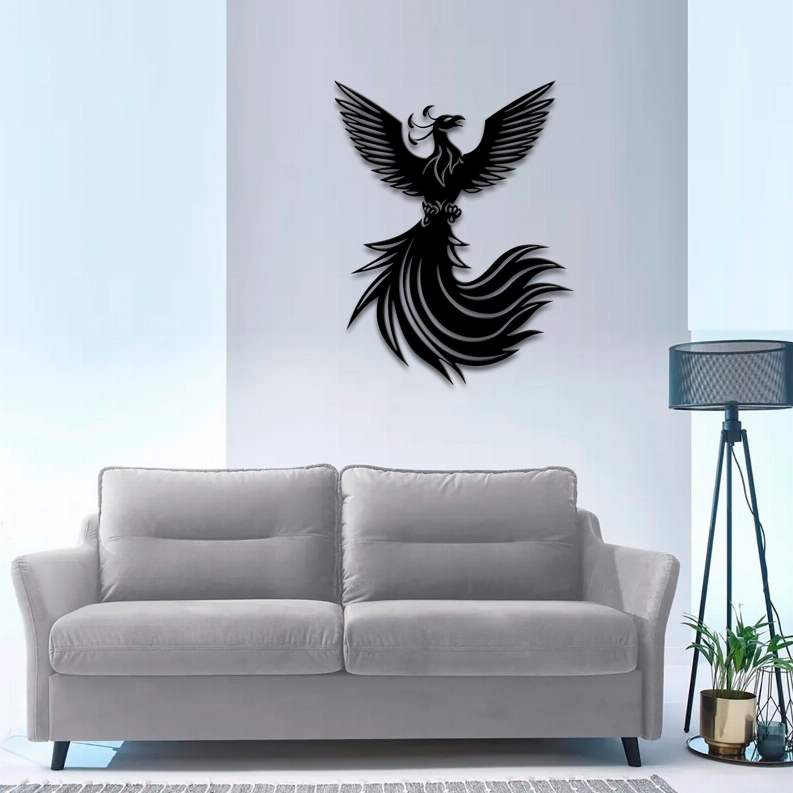 Black phoenix metal wall art with layered feather shapes on white wall