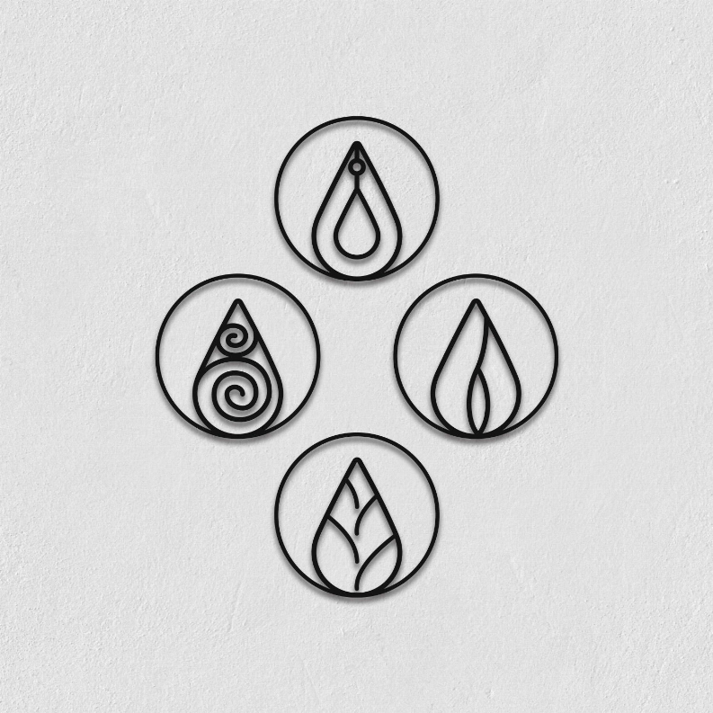 Close-up metal wall art set of four circular plaques with flame droplet line icons