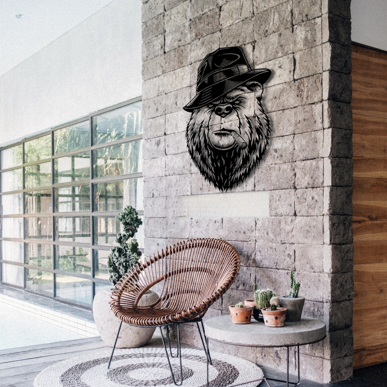 Metal wall art bear head with fedora and cigar mounted on stone wall