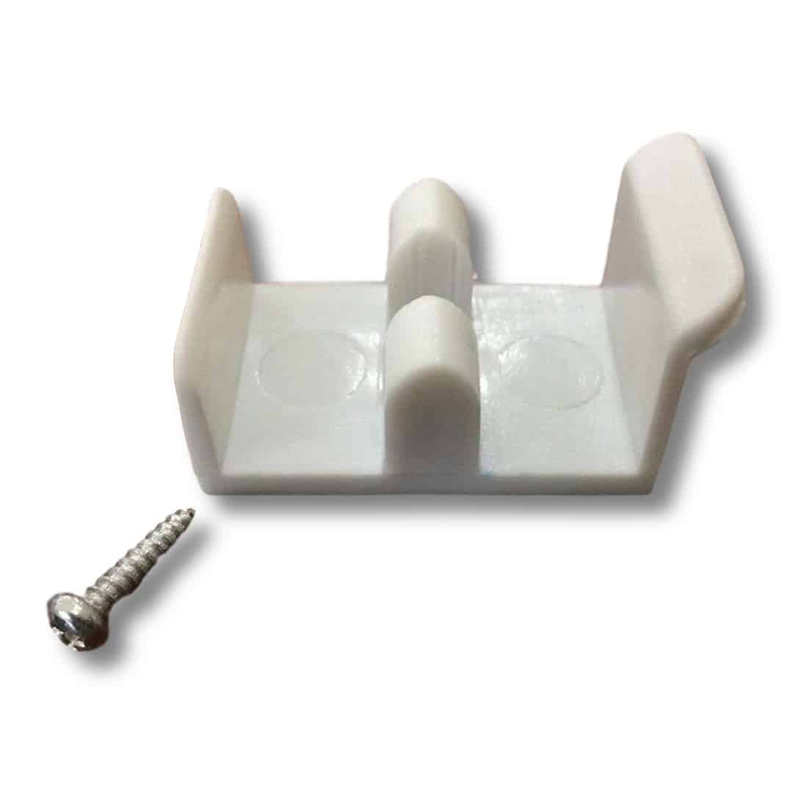 Shower door jamb guide with off-white plastic blocks and metal screw