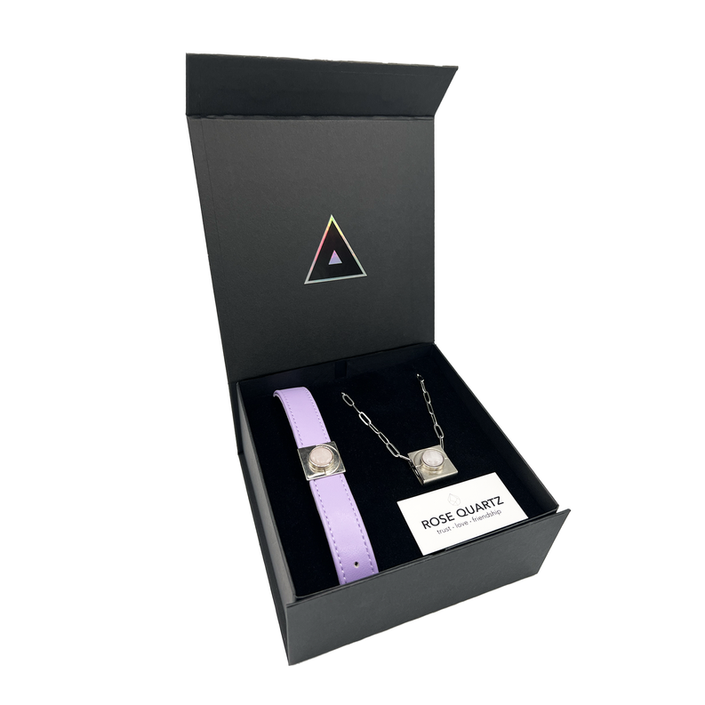 Open black gift box with lavender pet collar and rose quartz pendant set