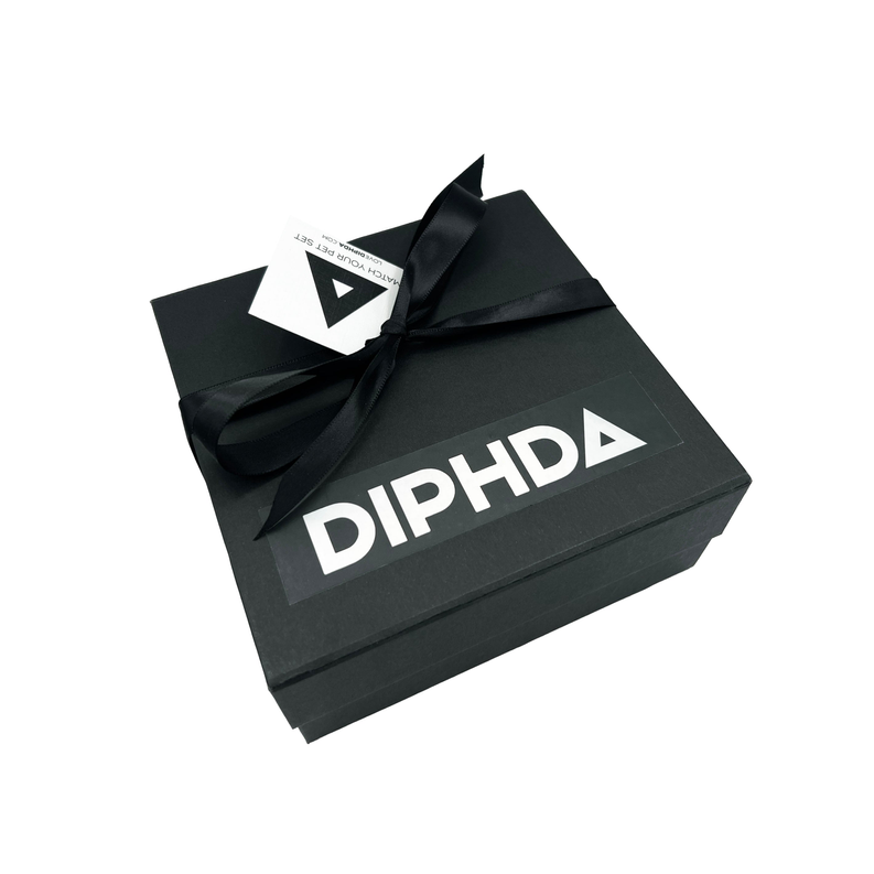 Closed black gift box with DIPHDA logo and black bow