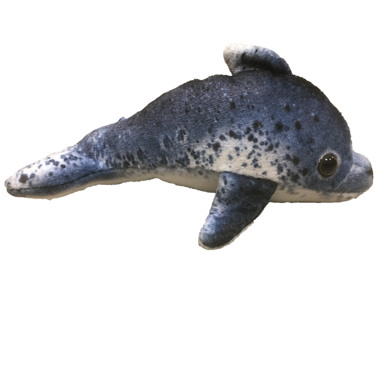 Small dolphin plush stuffed animal, dark blue with spotted pattern and stitched eye