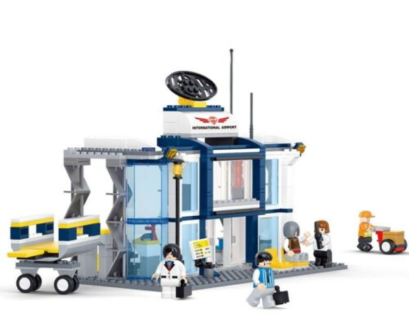 Airport terminal brick model with control tower radar dish, doors, and ground crew figures