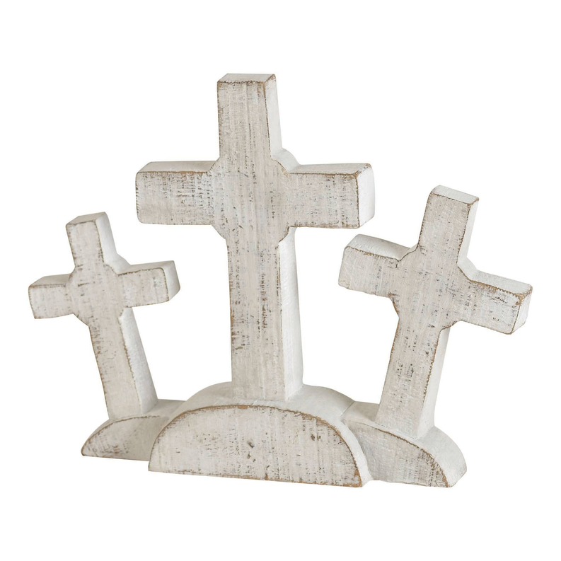 Three whitewashed tabletop crosses with curved base, front view