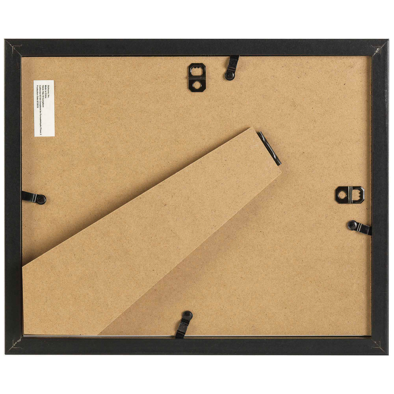 Back of framed wall art with cork backing and hanging hardware clips
