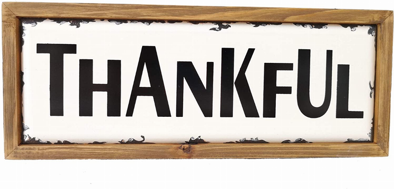 Tabletop wood block sign with 'THANKFUL' black lettering on white background, wood frame