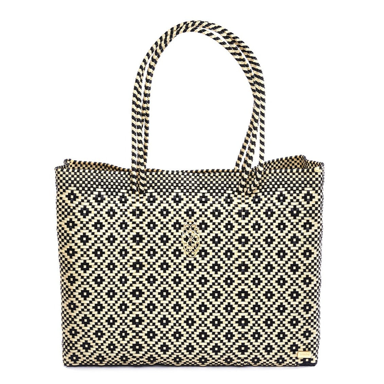 Woven travel tote with black-and-cream diamond pattern and top handles