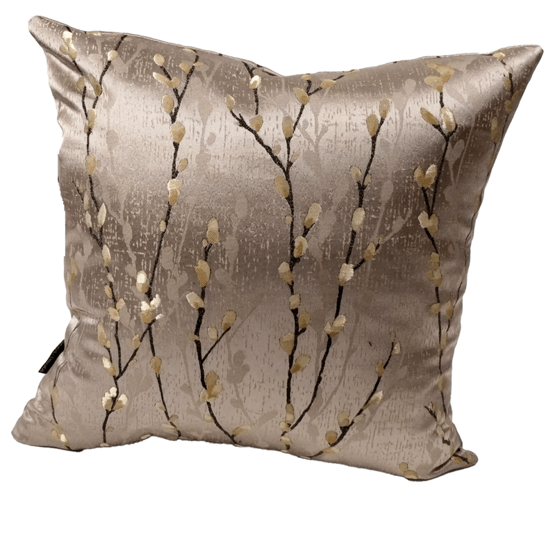 Taupe throw pillow cover with brass-gold twig and speckle pattern, stitched border.