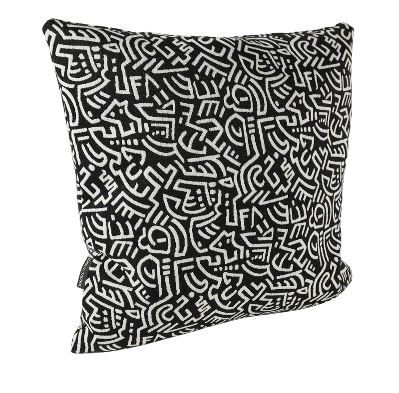 Pop Energy throw pillow in black with white abstract line pattern