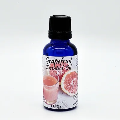 Grapefruit essential oil bottle, 1 fl oz, blue glass with black cap