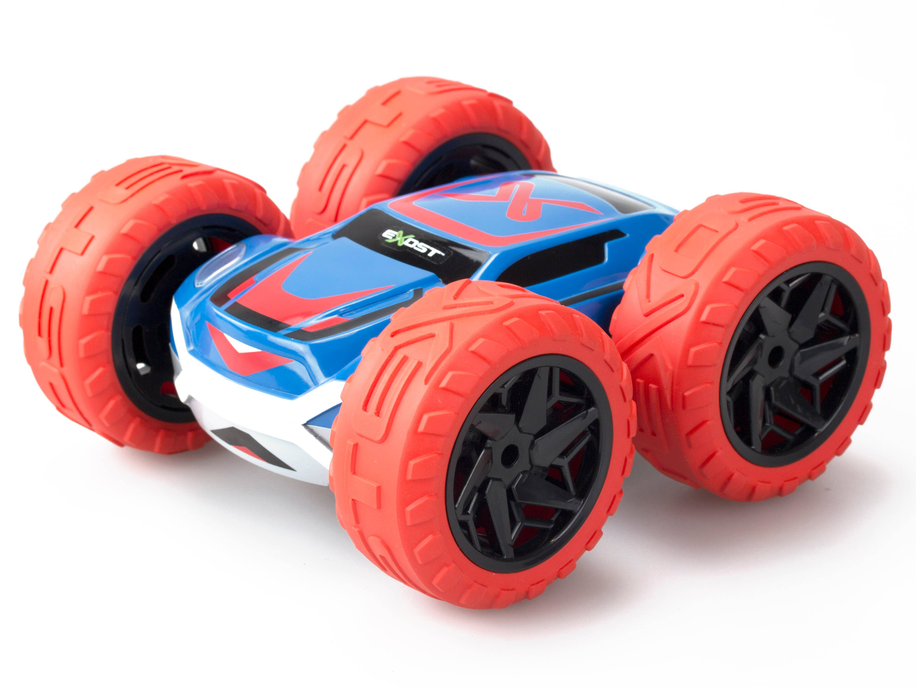 Red and blue stunt toy car with oversized treaded wheels, angled three-quarter view