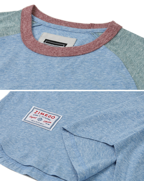 Raglan T-shirt neckline with pink trim and front logo patch