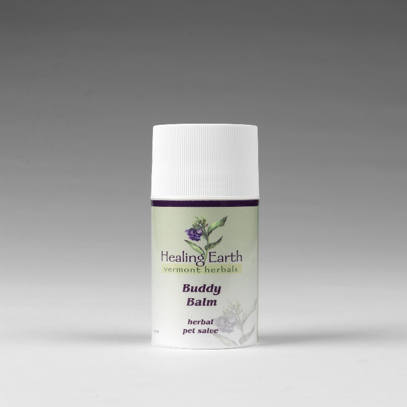 White balm bottle with purple band and Healing Earth Vermont Herbals label