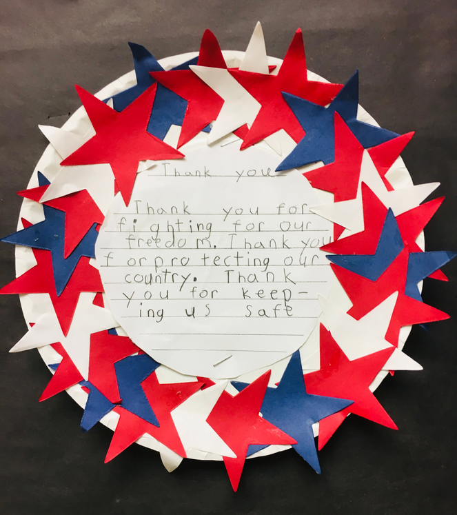 Star tri-color cut-out wreath with red, blue, and white star shapes