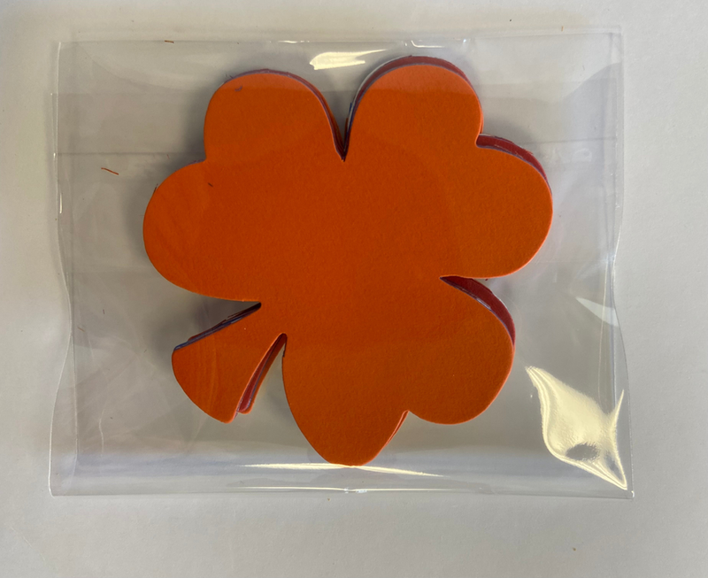 Orange felt shamrock cut-out in a clear sleeve