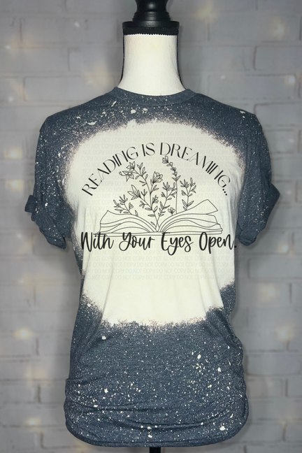 Dark blue bleached graphic tee with off-white center print, short sleeves, crew neck
