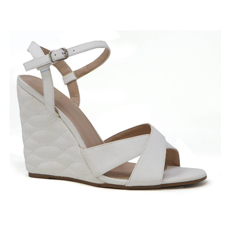 Women's quilted wedge heeled sandals with light buckle strap, open-toe design.