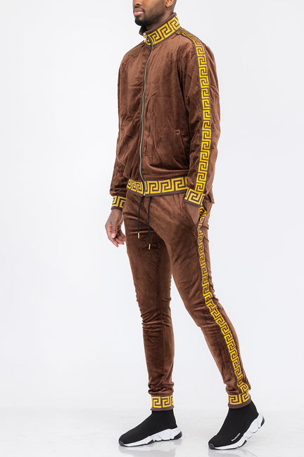 Brown velour track set with gold Greek-key trim, zip jacket and matching jogger pants