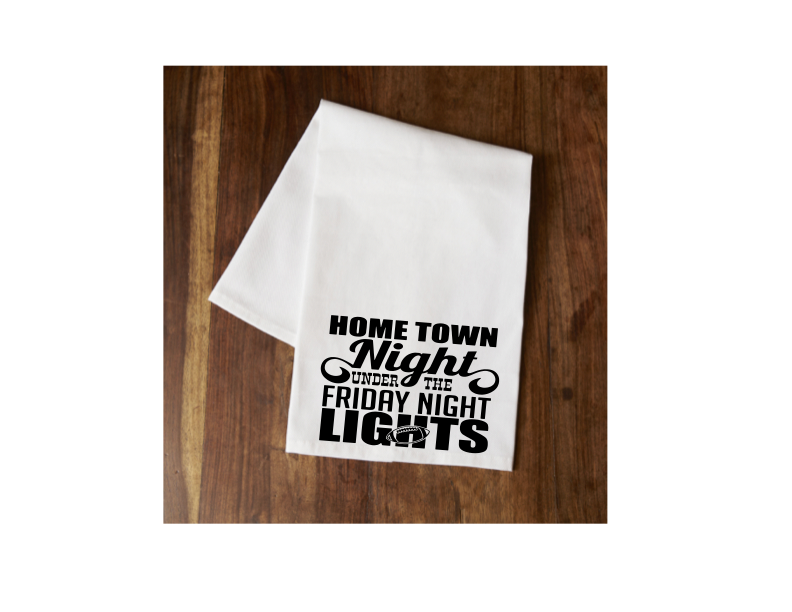White tea towel with black text Friday Night Lights