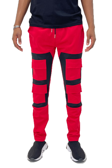 Red and black colorblock joggers with cargo pouch pockets and ankle cuffs
