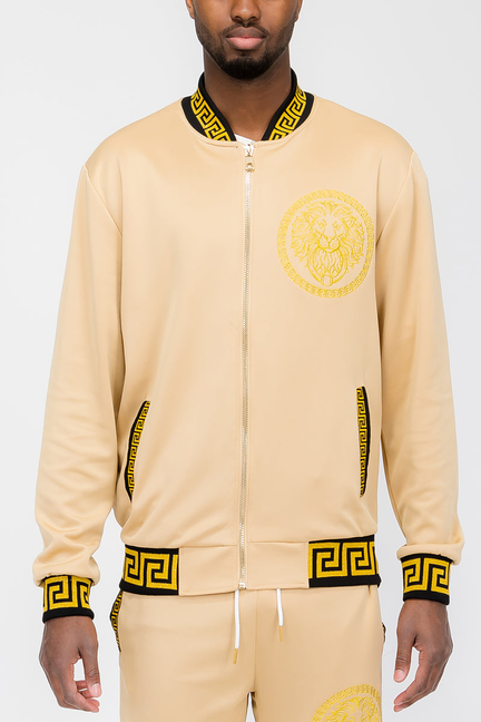 Khaki lion head track jacket with gold emblem, zip front, Greek key trim cuffs and hem