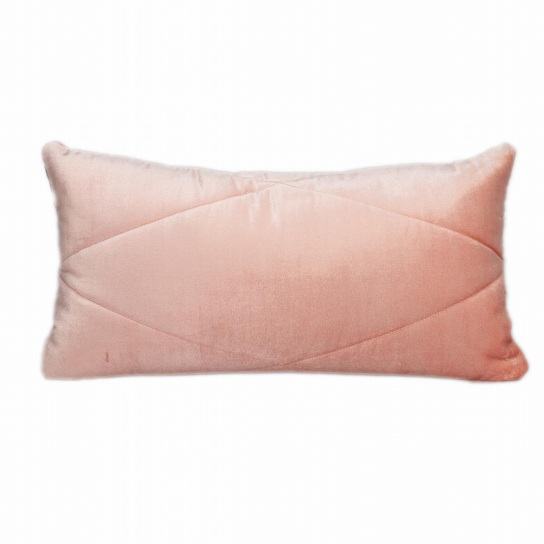 Light pink rectangular quilted throw pillow with curved channel stitch detail