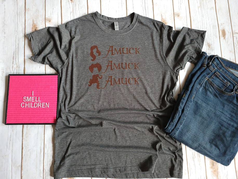 Gray crewneck T-shirt with orange 'Amuck' graphic front