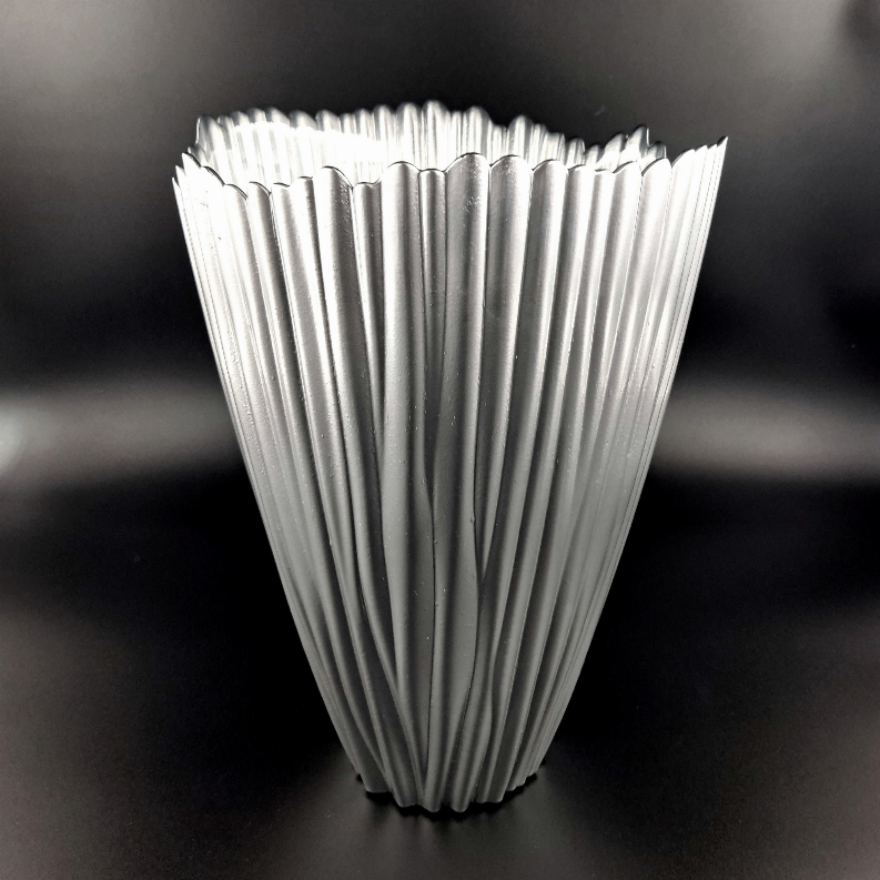 Silver-toned fluted glass vase with flared top rim