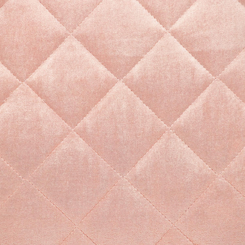 Close-up of dusty rose quilted throw pillow fabric with diamond stitch quilting