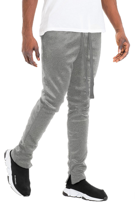Solid gray track pants with tapered ankle cuffs