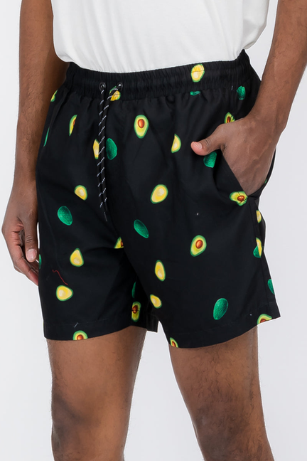 Black swim shorts with avocado print, elastic waistband and drawstring ties
