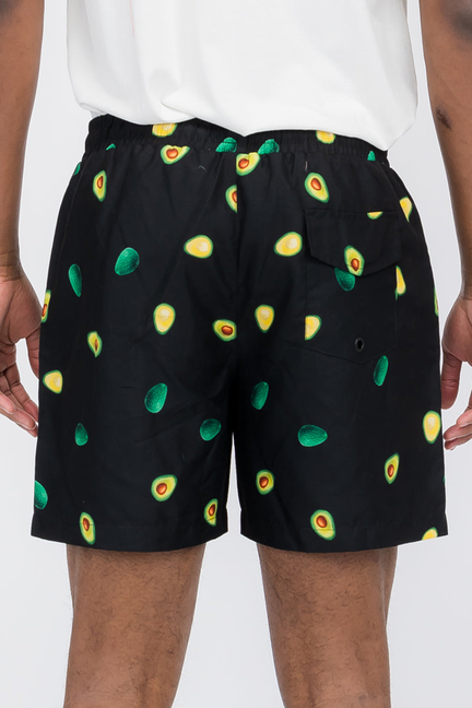 Black swim shorts with colorful avocado print, elastic waistband and drawstring