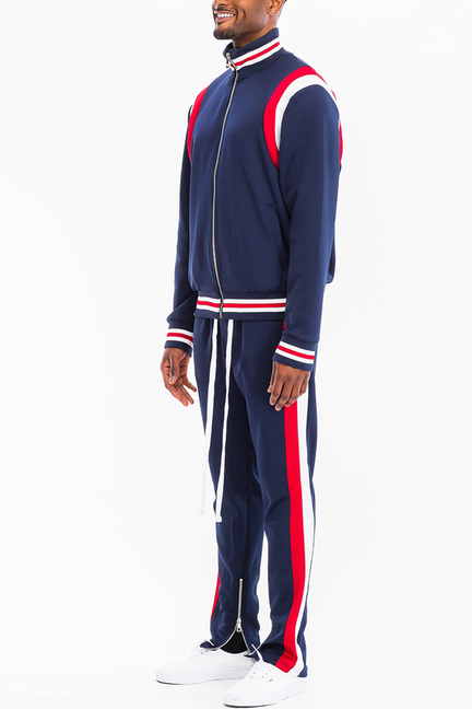 Navy zip-front track jacket and pants set with red-and-white side stripe detail