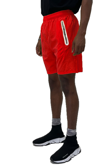 Red performance running shorts with elastic waistband and drawstring hem, side pocket