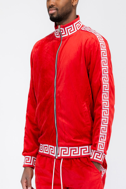 Red velour track jacket with white trim, zip front, and Greek key sleeve stripe