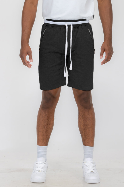 Black French terry shorts with white drawstring and elastic waist, above-knee length