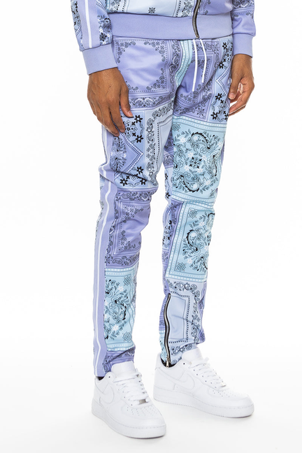 Lavender paisley all-over print track pants with tapered legs and elastic cuffs