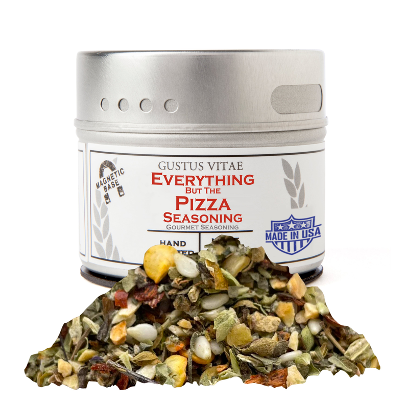 Everything but the pizza seasoning jar with mixed herbs and seasoning pile