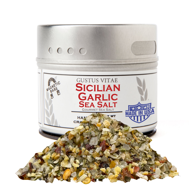 Sicilian garlic sea salt seasoning jar with herb and garlic flakes pile