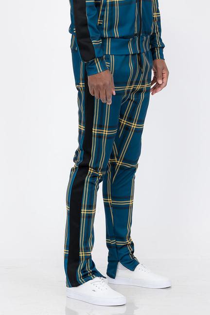 Plaid track pants in dark teal with yellow grid pattern, elastic cuffs and waistband