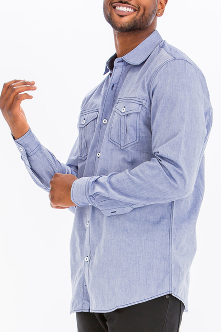 Ocean-blue long-sleeve button-up shirt with outline stitching and two chest pockets
