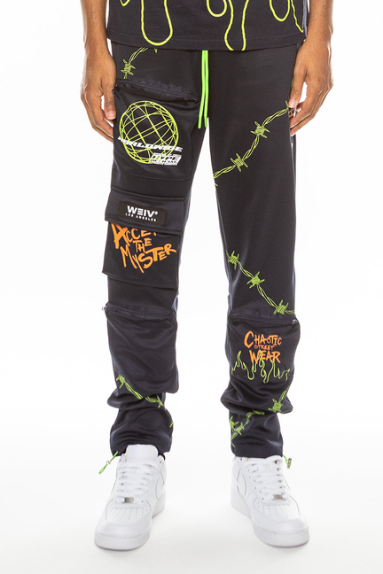 Hype black track pants with neon green graphic print and cuffed ankle hem