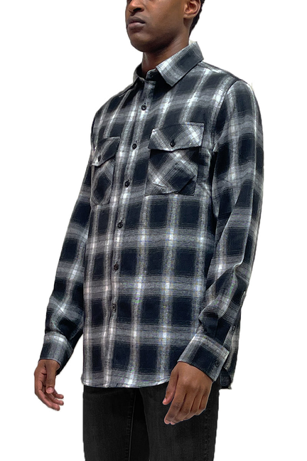 Dark plaid flannel button-up shirt with flap chest pockets, long sleeves