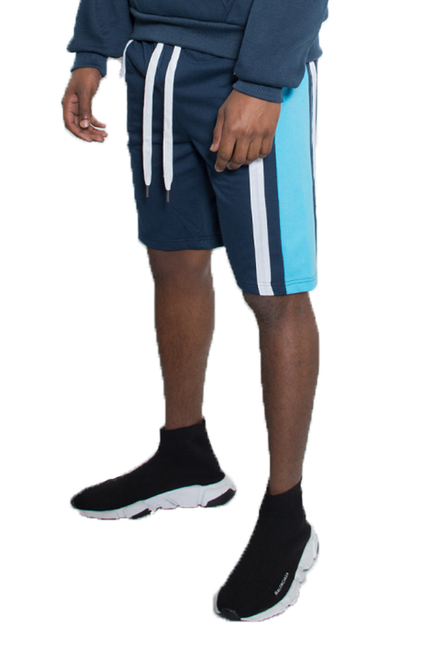 Navy French terry shorts with white drawstring and vertical stripe panels