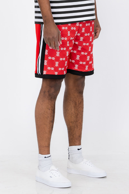 Red linked pattern shorts with black side trim