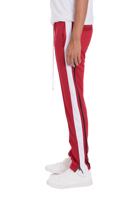 Red tricot sweat pants with white vertical side stripe and tapered legs