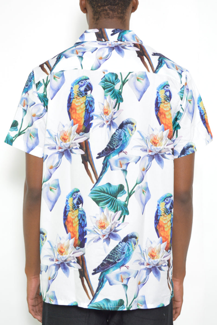 Short sleeve button-up shirt with back parrot and flower print, white background
