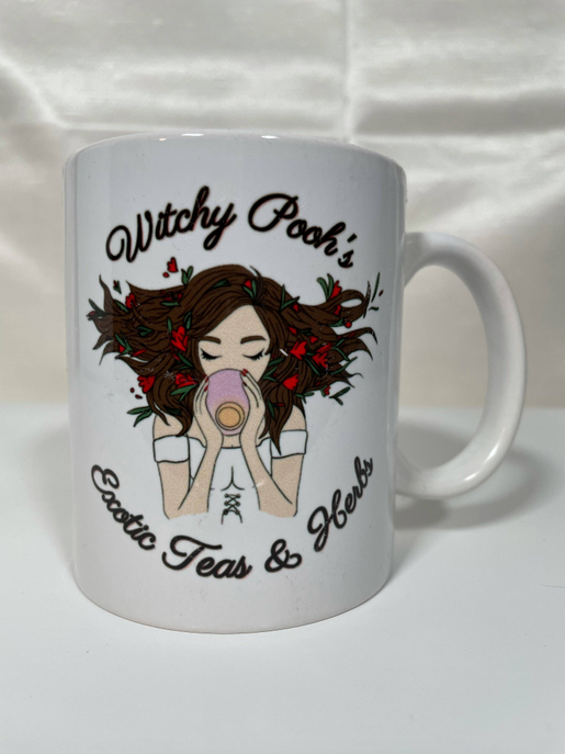 White ceramic mug with witch girl holding incense, "Exotic Teas & Herbs" text
