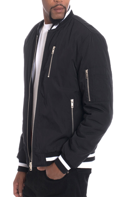 Black twill jacket with stand collar, zip pocket details, white striped cuffs and hem.